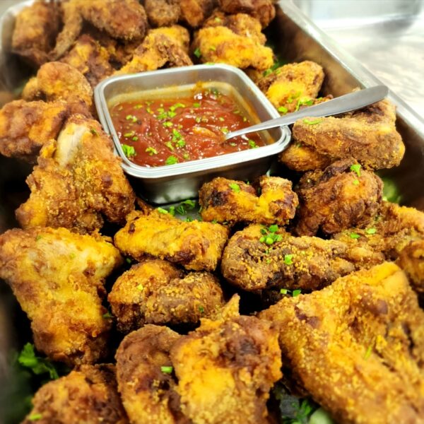 Alitas empanizadas en salsa picante