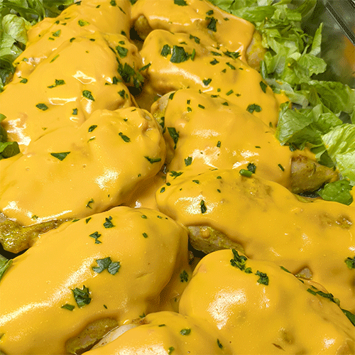 Suprema de pollo en salsa cheddar